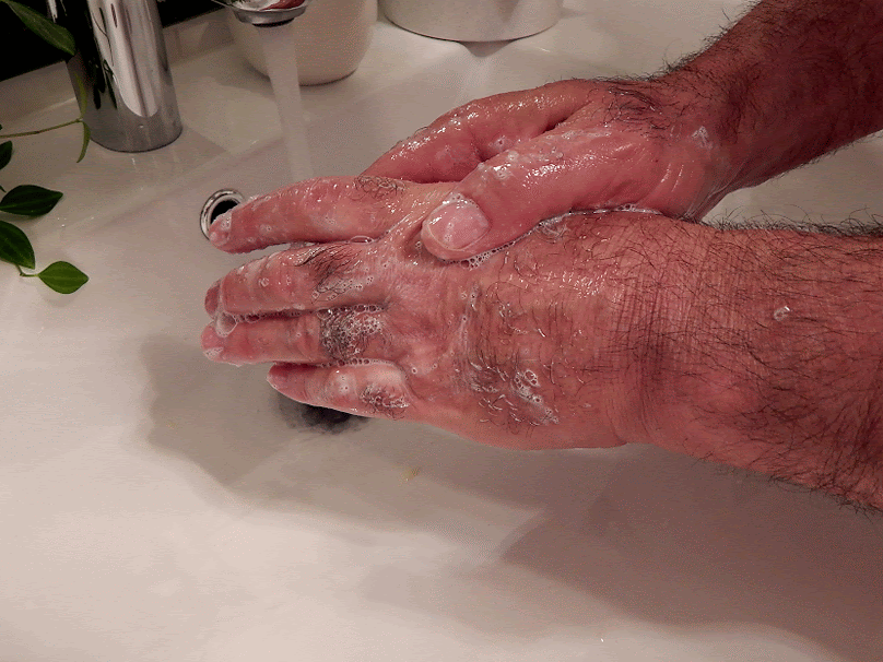 washing hands with the foaming hand and foot scrub